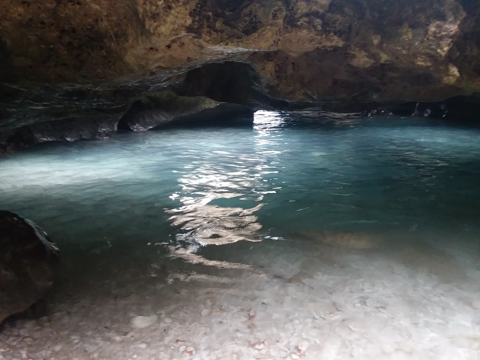 Inside the Mermaid Caves with glowing turquoise water, March 2018