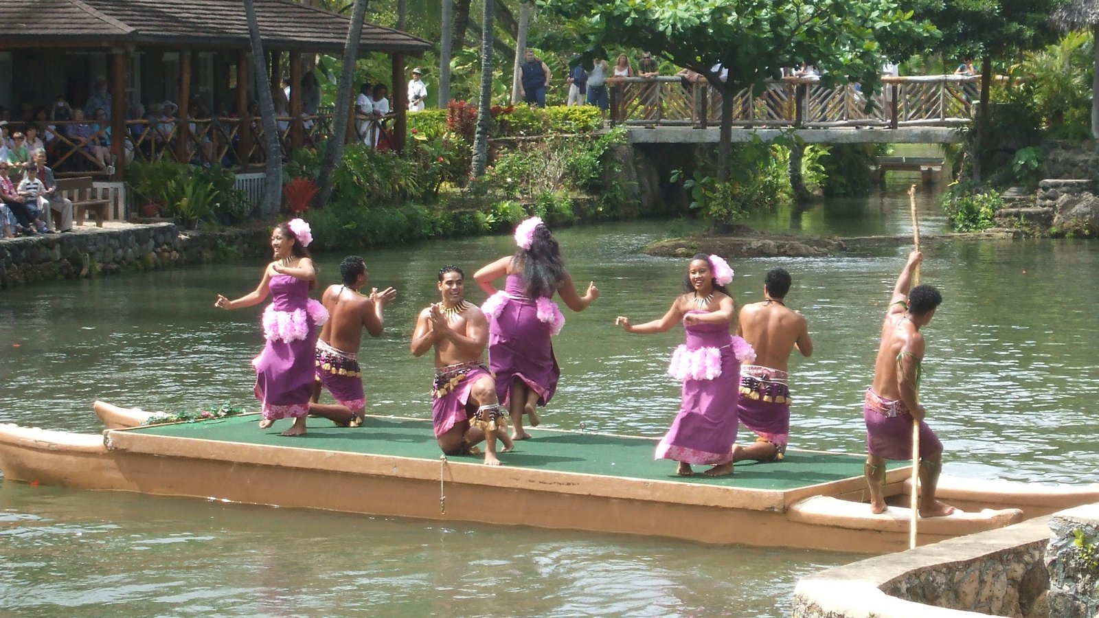 Dancers on a canoe at the Polynesian Cultural Center