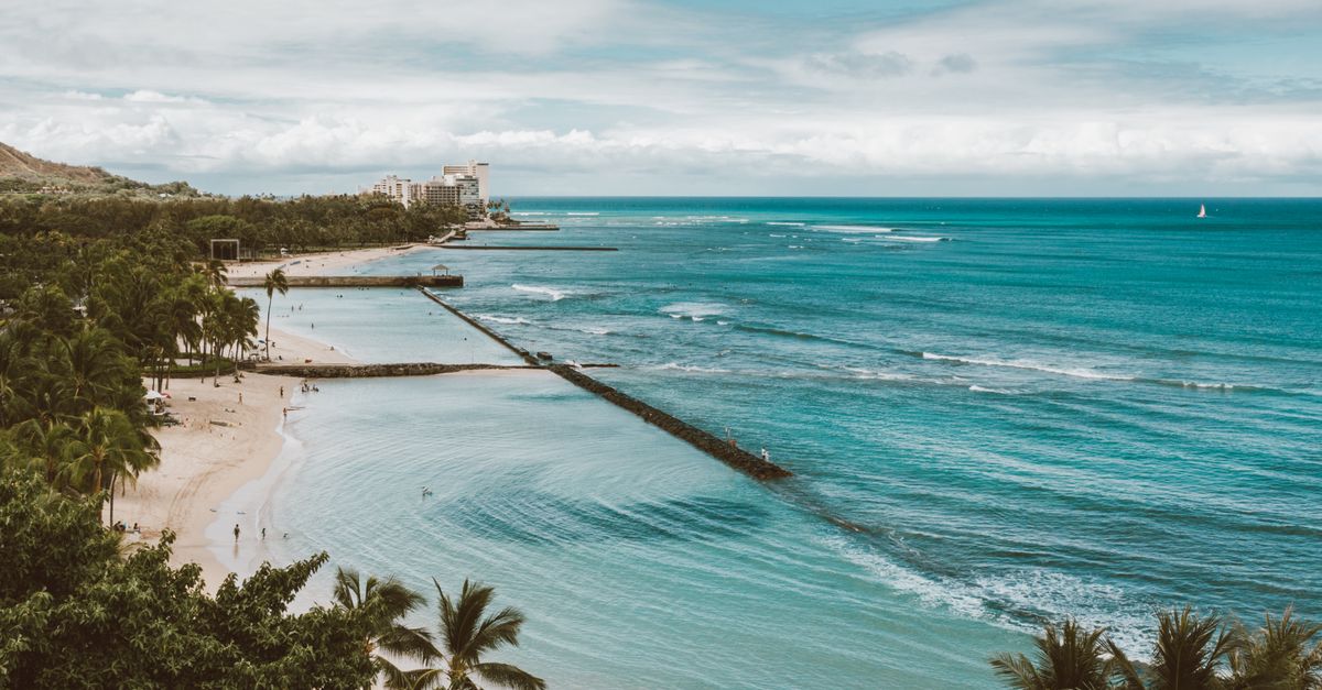 Aerial view of blue ocean and tropical beach